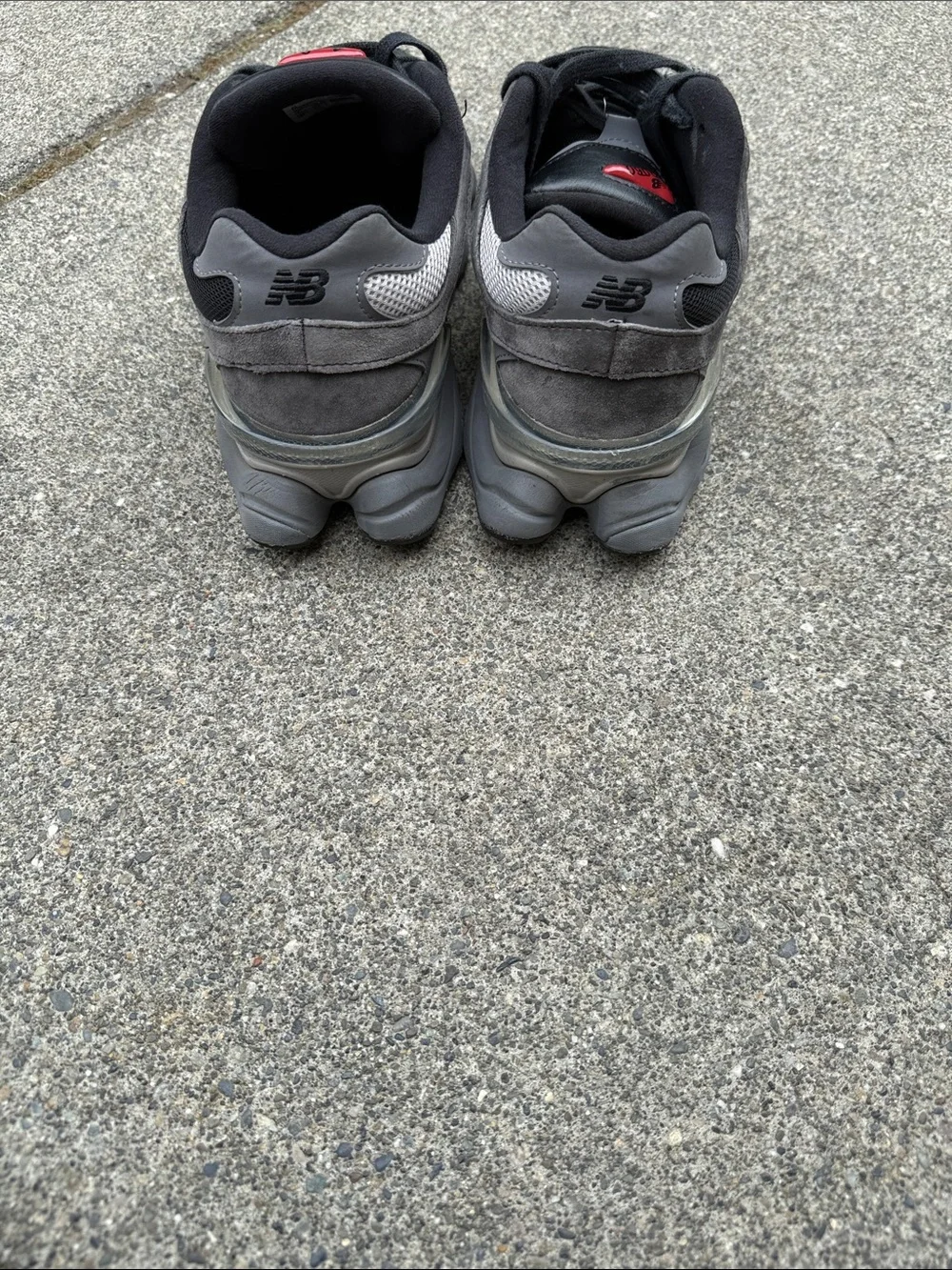 New Balance Black and Gray Men's Athletic Sneakers with Red Tongue Accents